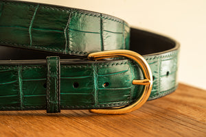 green crocodile belt with gold buckle